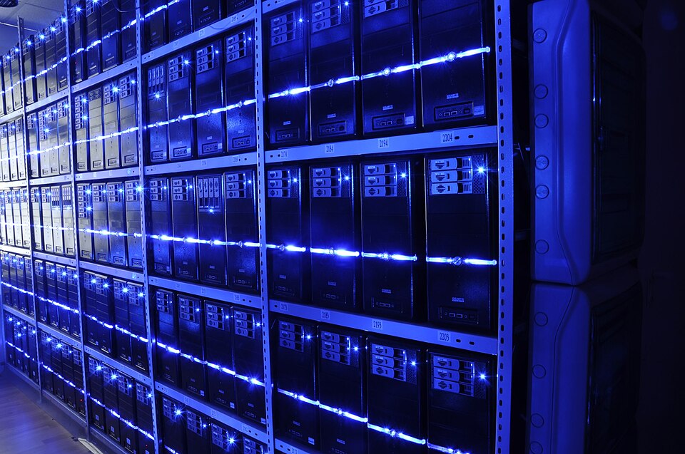 Racks of servers in an enterprise data center that AI agents reach through software credentials and connected APIs, a core AI agent access security concern