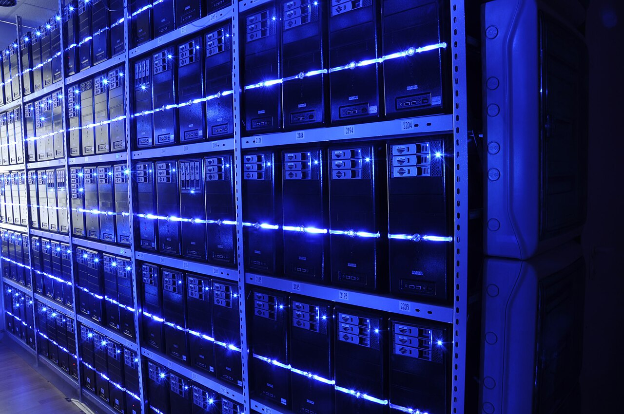 Enterprise data center server racks representing the blast radius of stolen AI account credentials and API keys