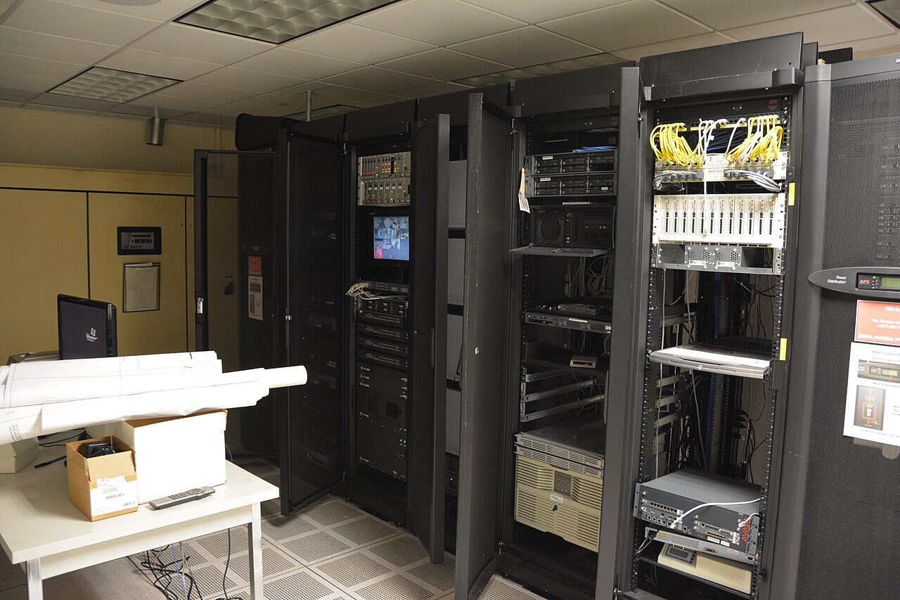 Rack of servers inside an enterprise data center where AI gateways and model API keys are hosted